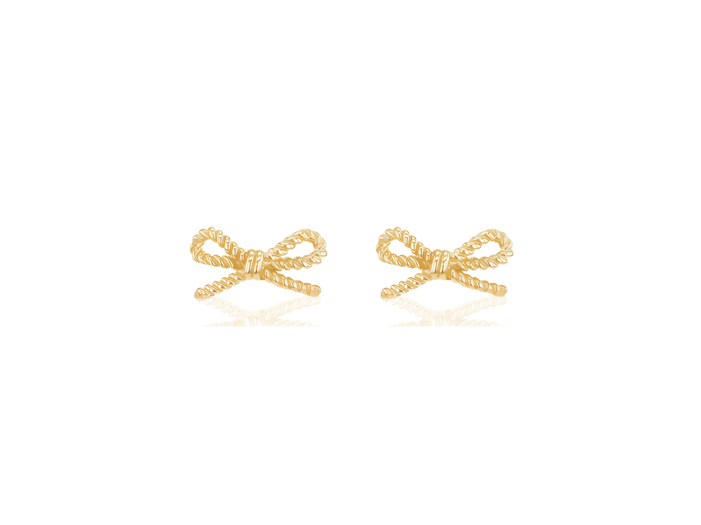 Gold bow-shaped earrings on a white background