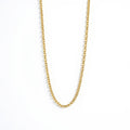 A gold chain necklace with a classic trace link design, displayed against a clean white background.