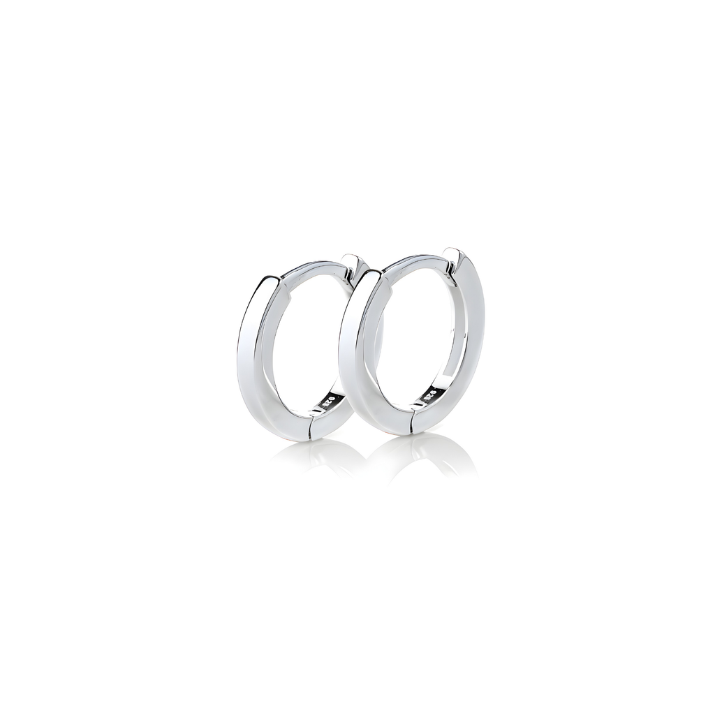 Pair of silver hoop earrings on a white background