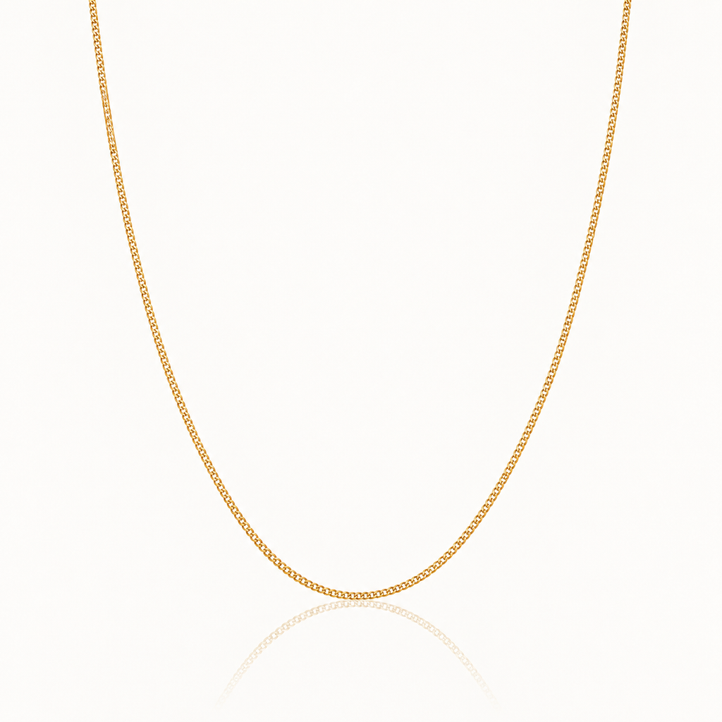 A delicate yellow gold chain necklace displayed in a U-shape against a clean white background with a subtle reflection below.